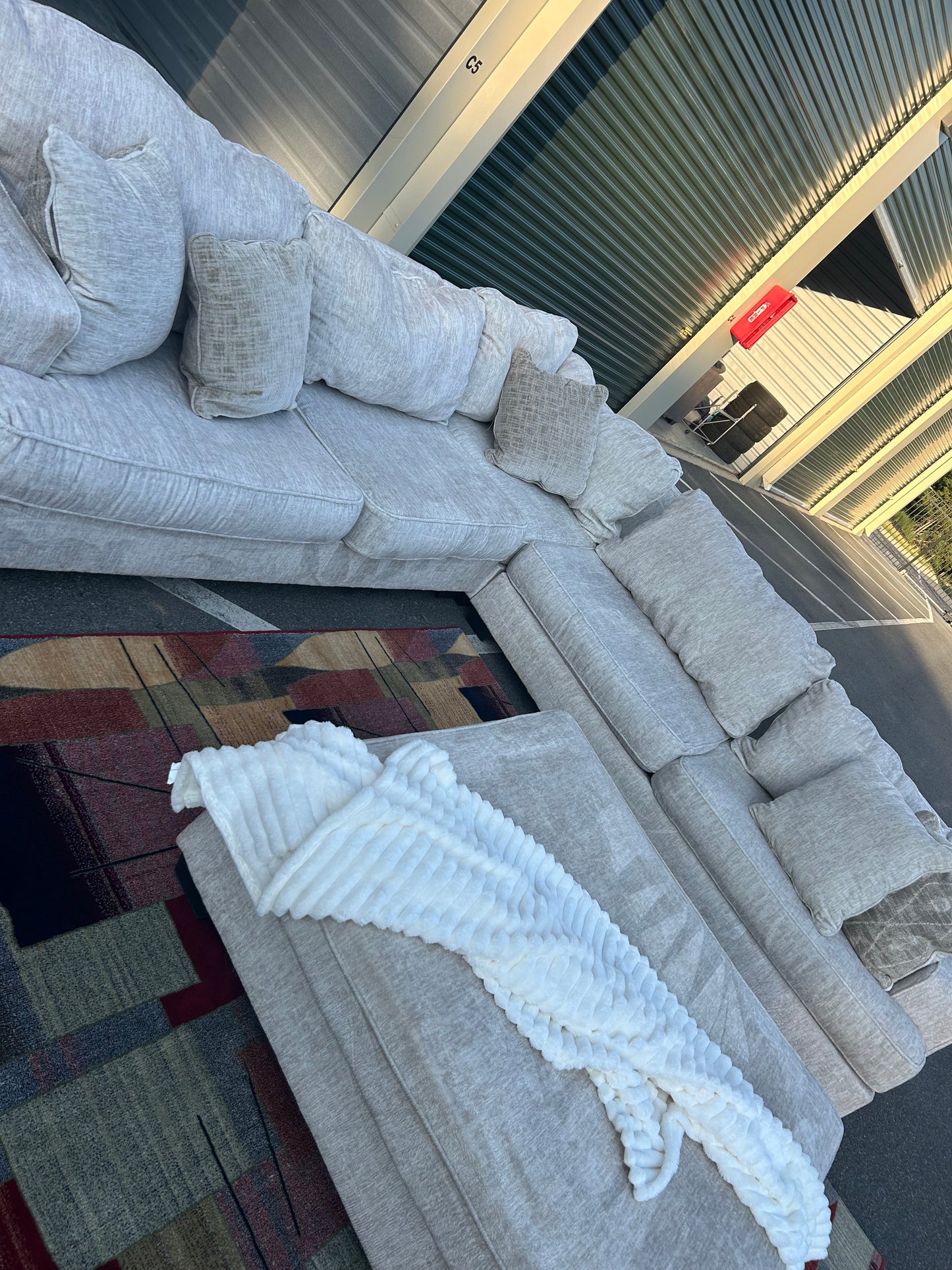 Ashley Rawcliffe Sectional Sofa/ Couch w Oversized ottoman (We Deliver)
