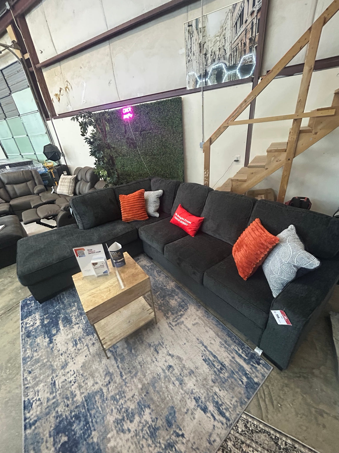 Altari slate left-chaise sectional in the Couch King showroom