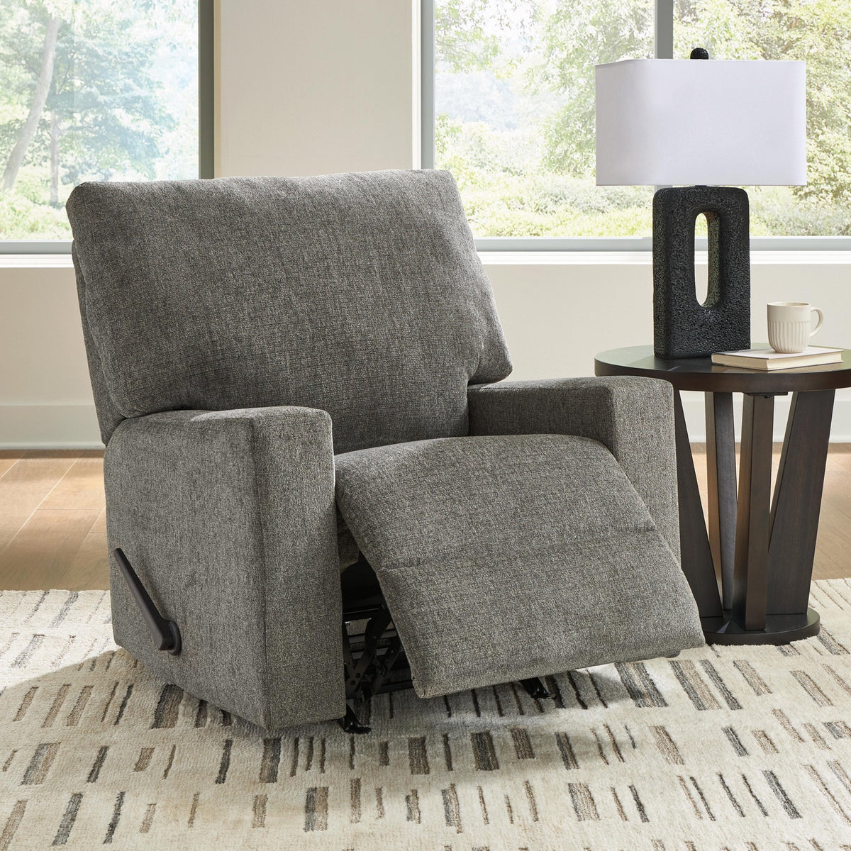 Matching gray Ashley recliner with footrest extended