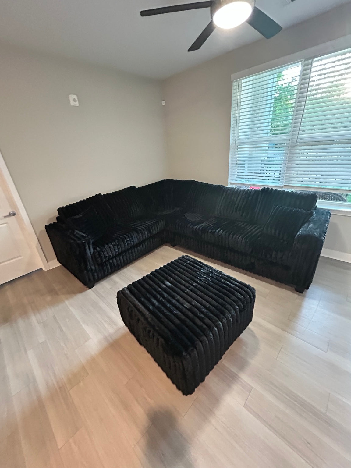 Black plush corduroy sectional wide view