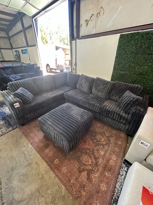 Grey corduroy sectional with matching ottoman