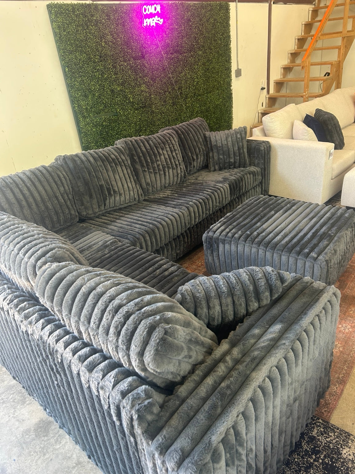 Grey corduroy sectional with matching ottoman