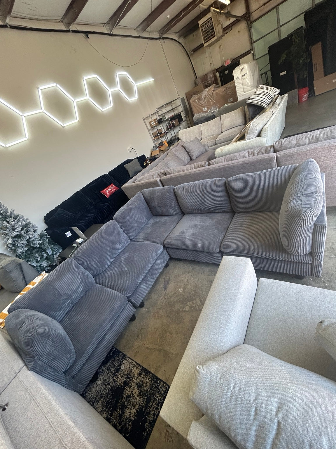 Grey corduroy U-shaped sectional front angle