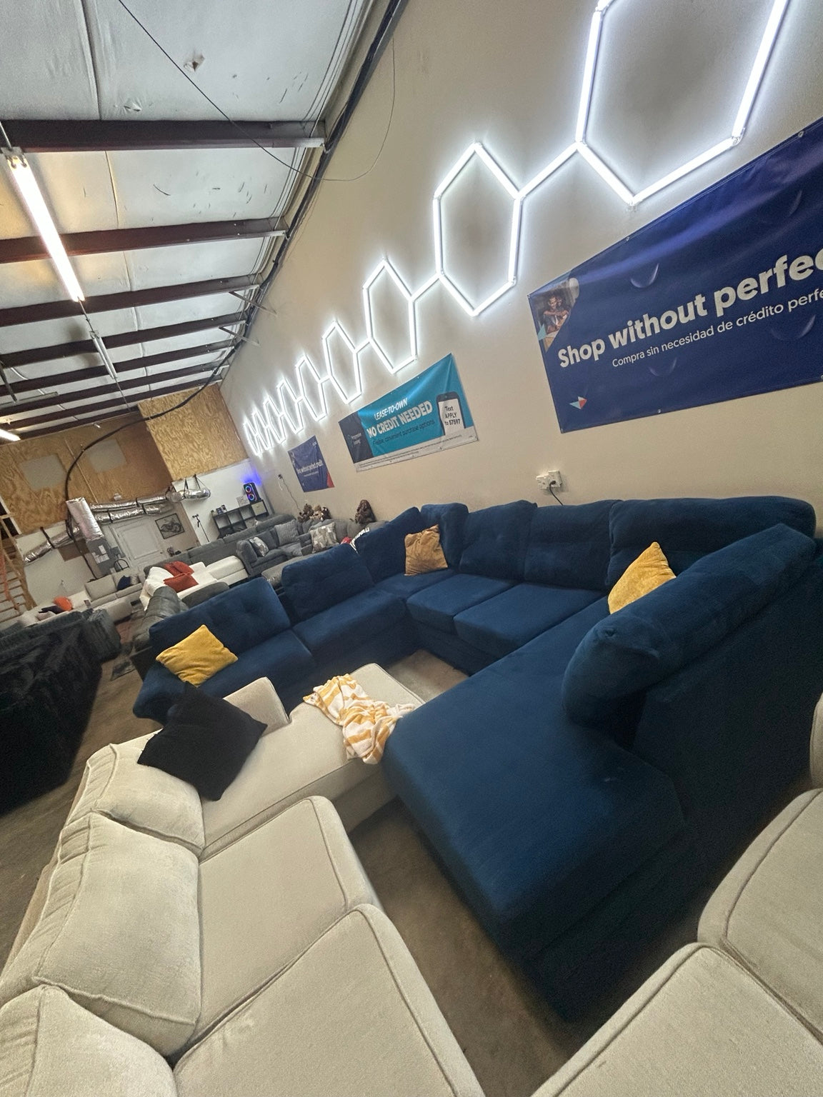 Used blue oversized U-shaped sectional