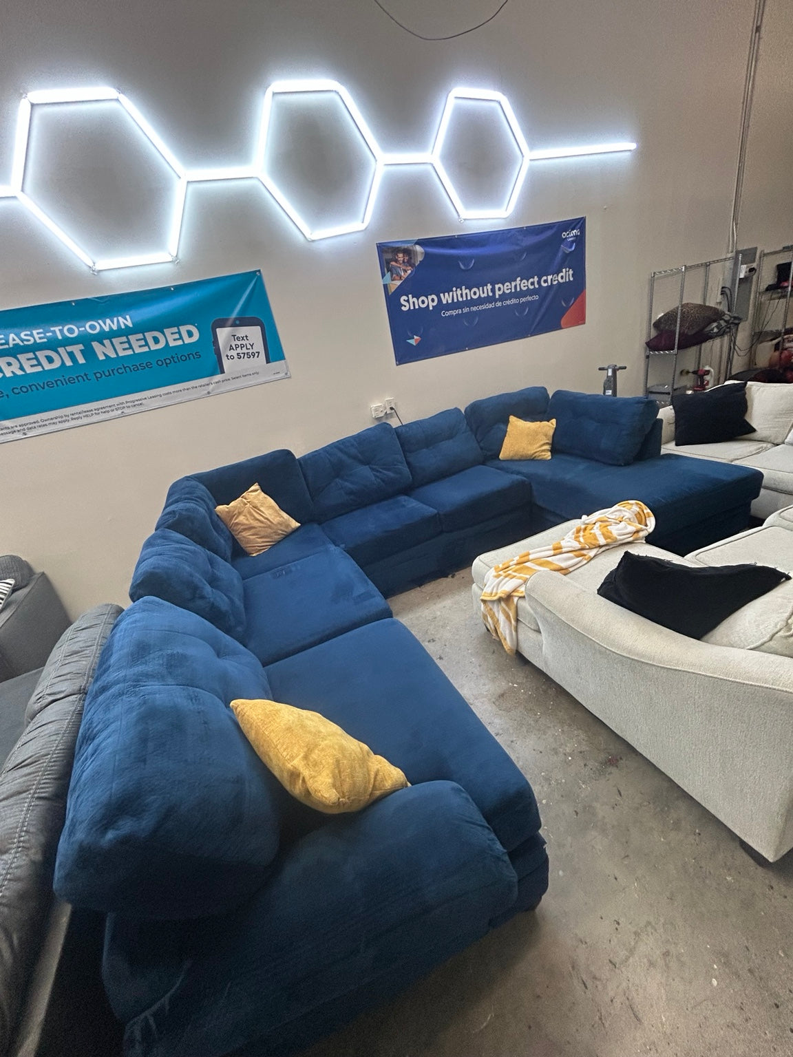 Used blue oversized U-shaped sectional