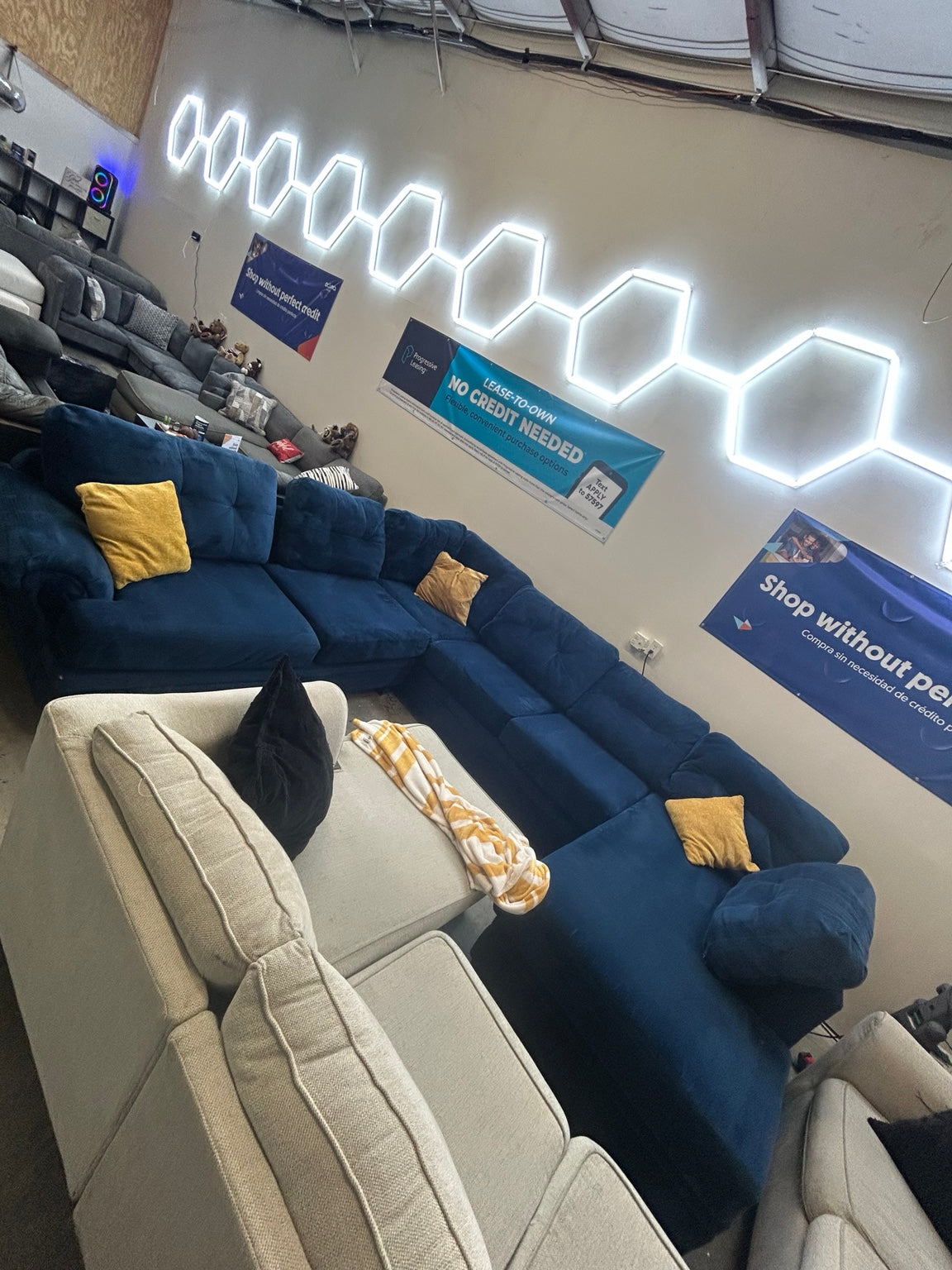 Used blue oversized U-shaped sectional