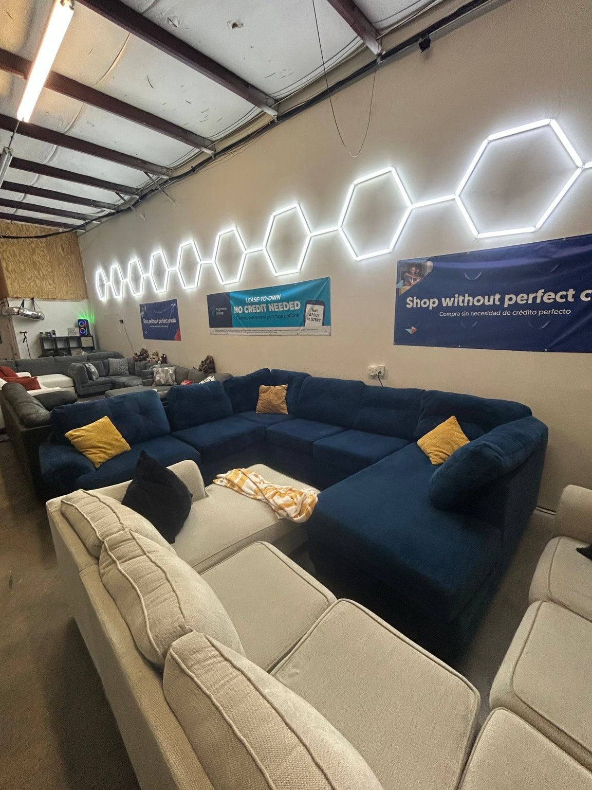Used blue oversized U-shaped sectional
