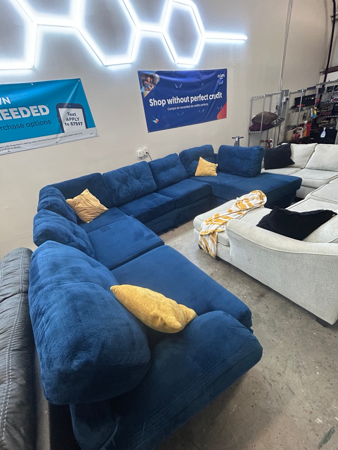 Used blue oversized U-shaped sectional