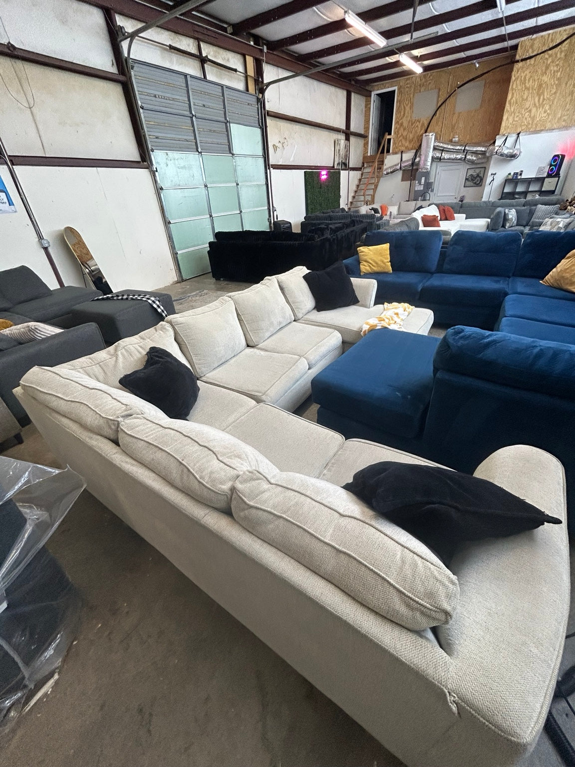 Used cream U-shaped sectional with chaise