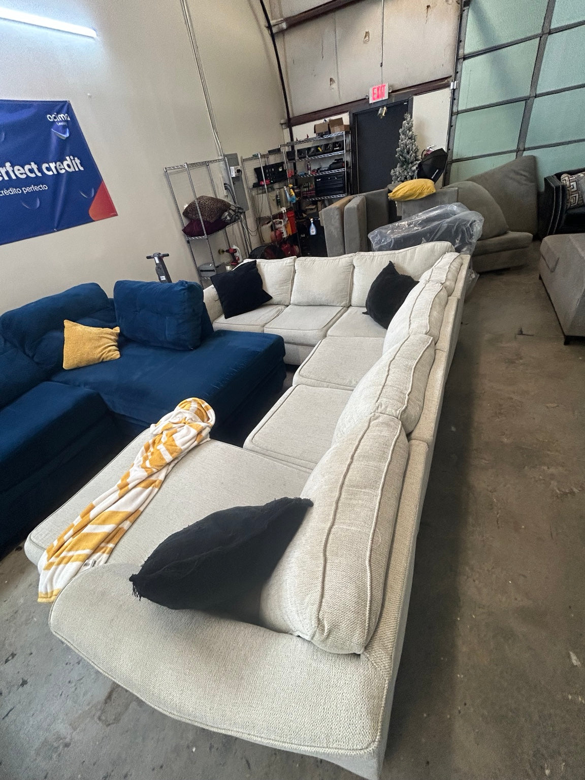 Used cream U-shaped sectional with chaise